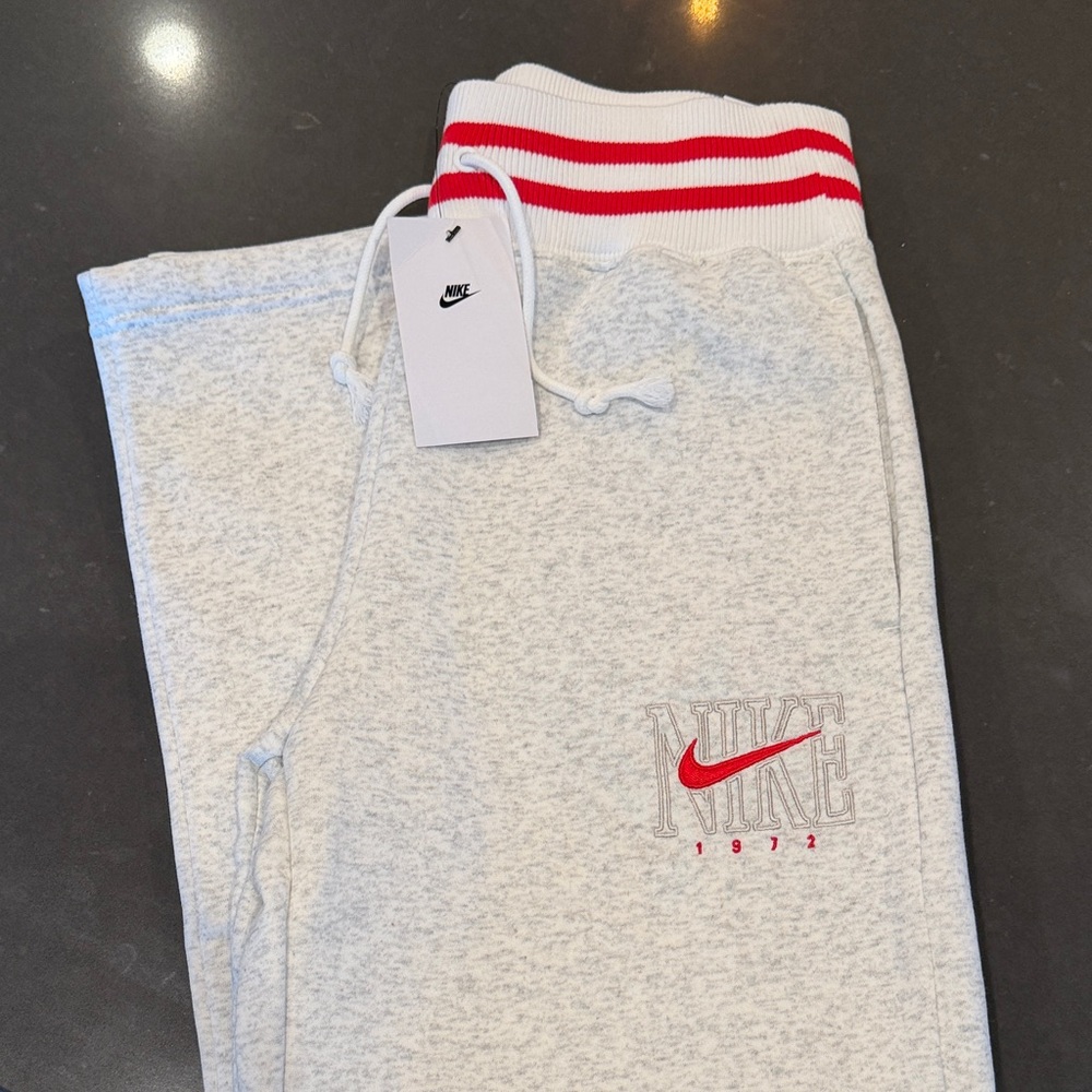 Nike Women’s Light Gray Joggers with Red Stripes